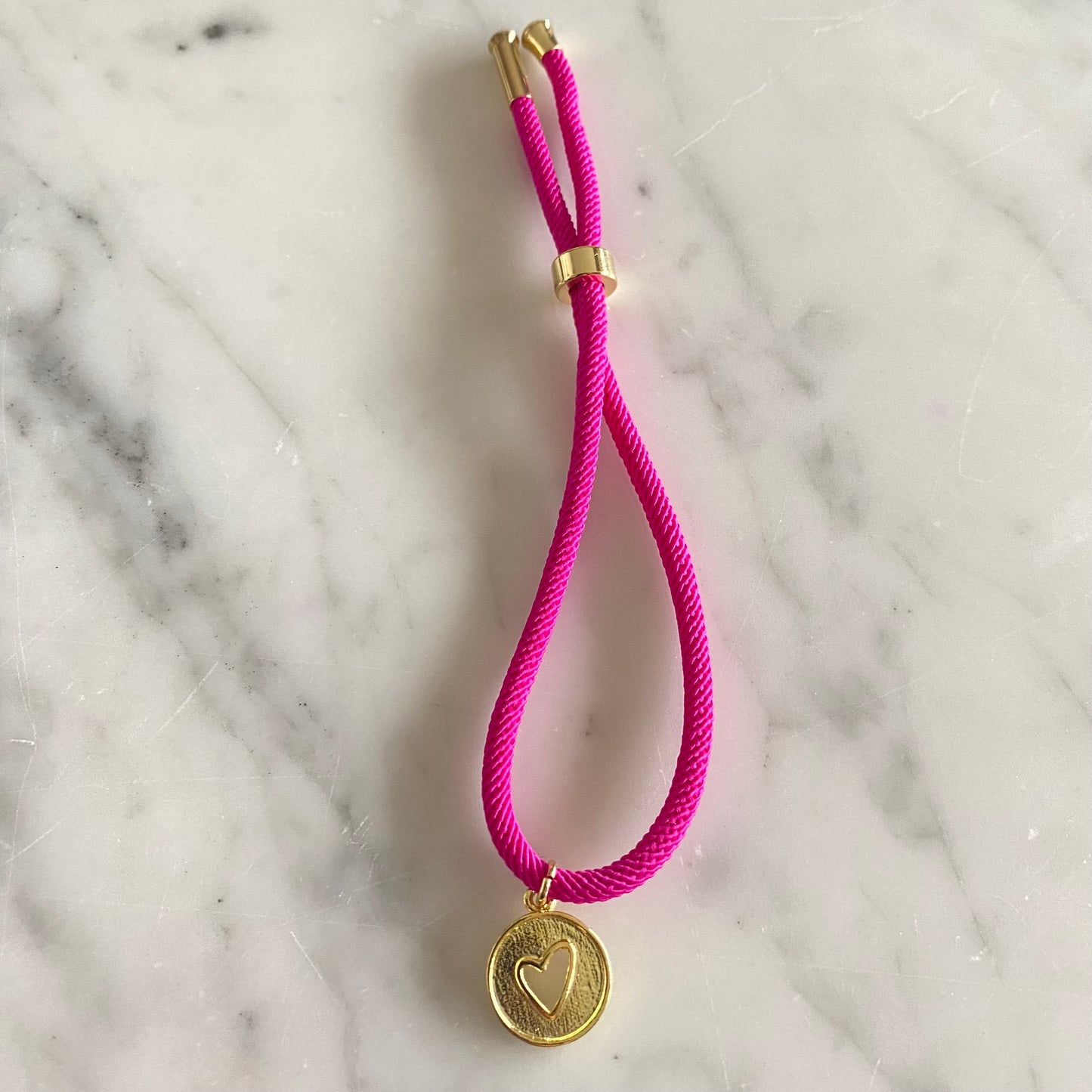 Pulsera Cordón Fucsia